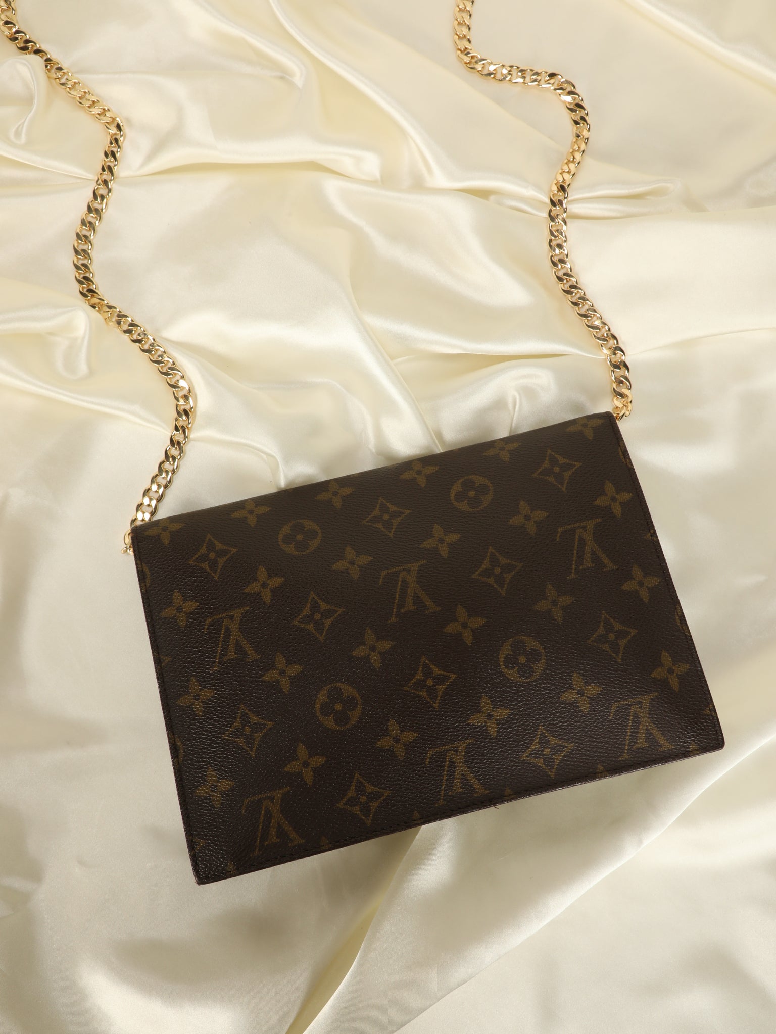 lv clutch with gold chain