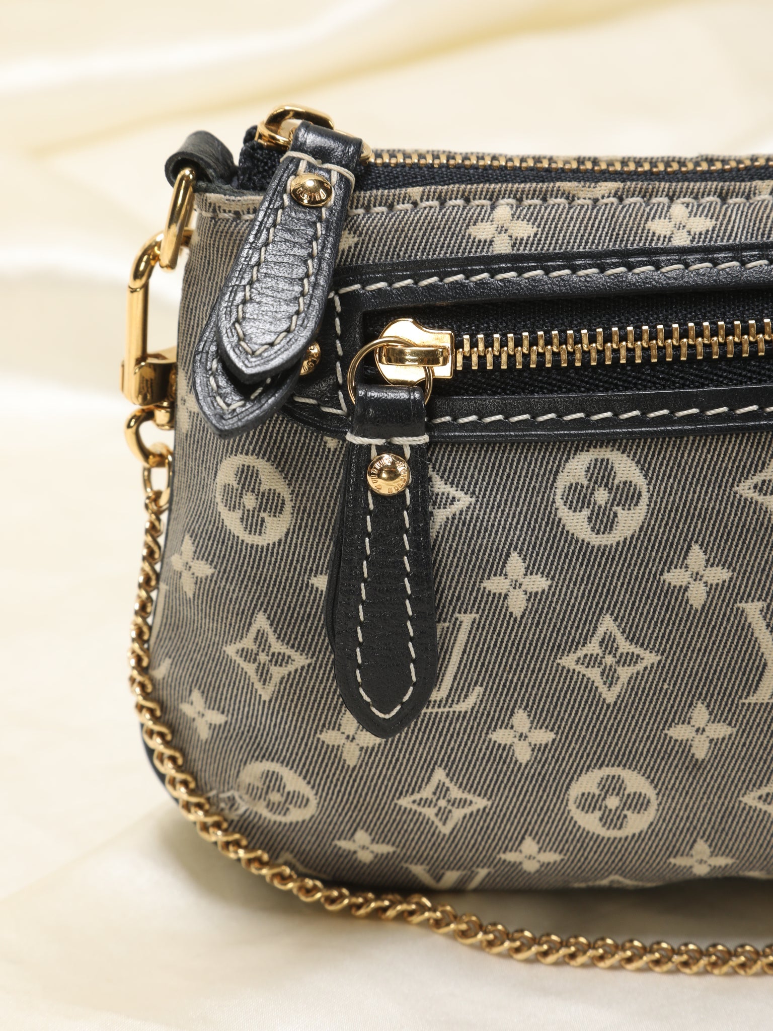 Louis Vuitton Mini Lin Mini Pochette Bag