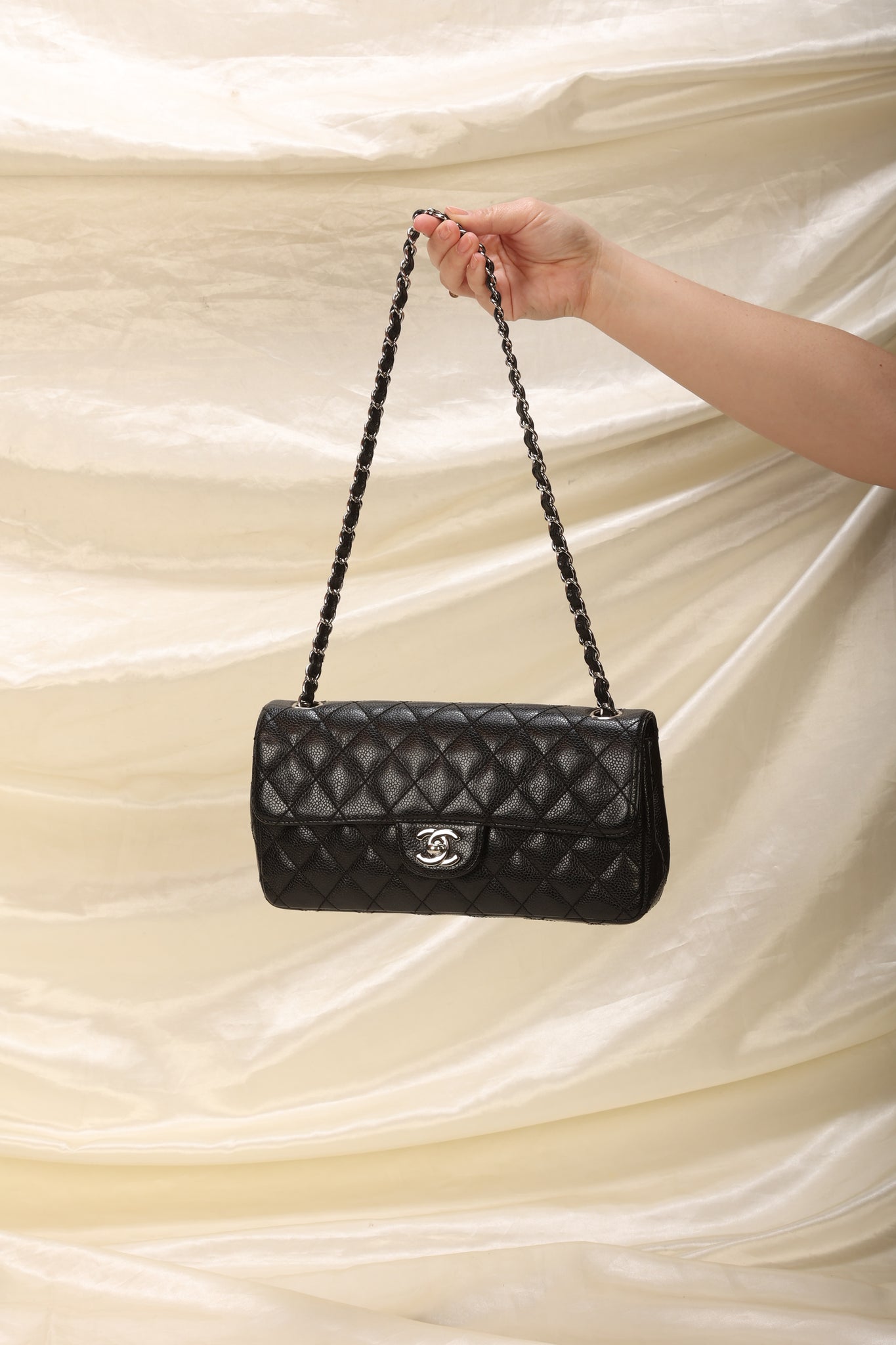 Authentic Chanel East West Flap Shoulder Bag in Black Caviar Leather with  Silver Hardware SHW, Luxury, Bags & Wallets on Carousell