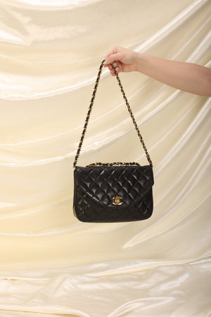 Chanel Round Quilted Lambskin Flap Bag
