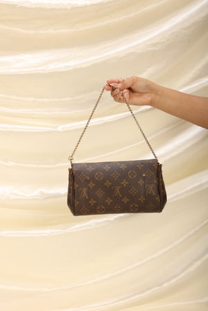 Authentic Louis Vuitton Favorite PM Monogram Canvas Cluth Bag
