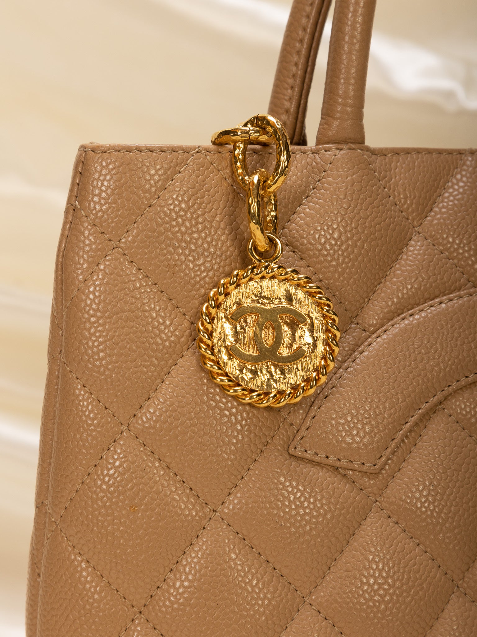 CHANEL, Bags, Chanel Classic Gold Medallion Cc Logo Quilted Caviar Tote  Bag Beige