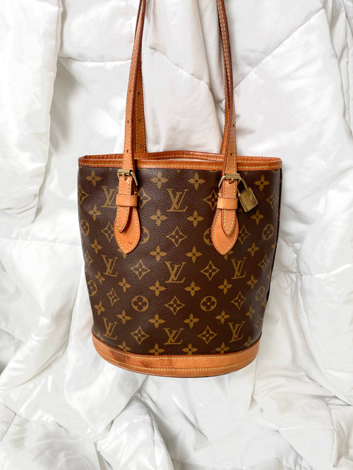 Louis Vuitton monogram petit bucket bag just came in!! This has a
